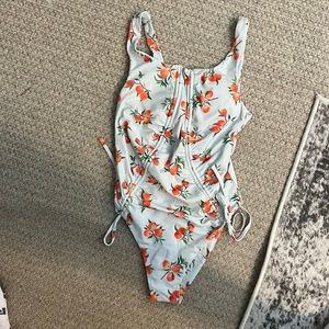 Kittenish one piece swimsuit